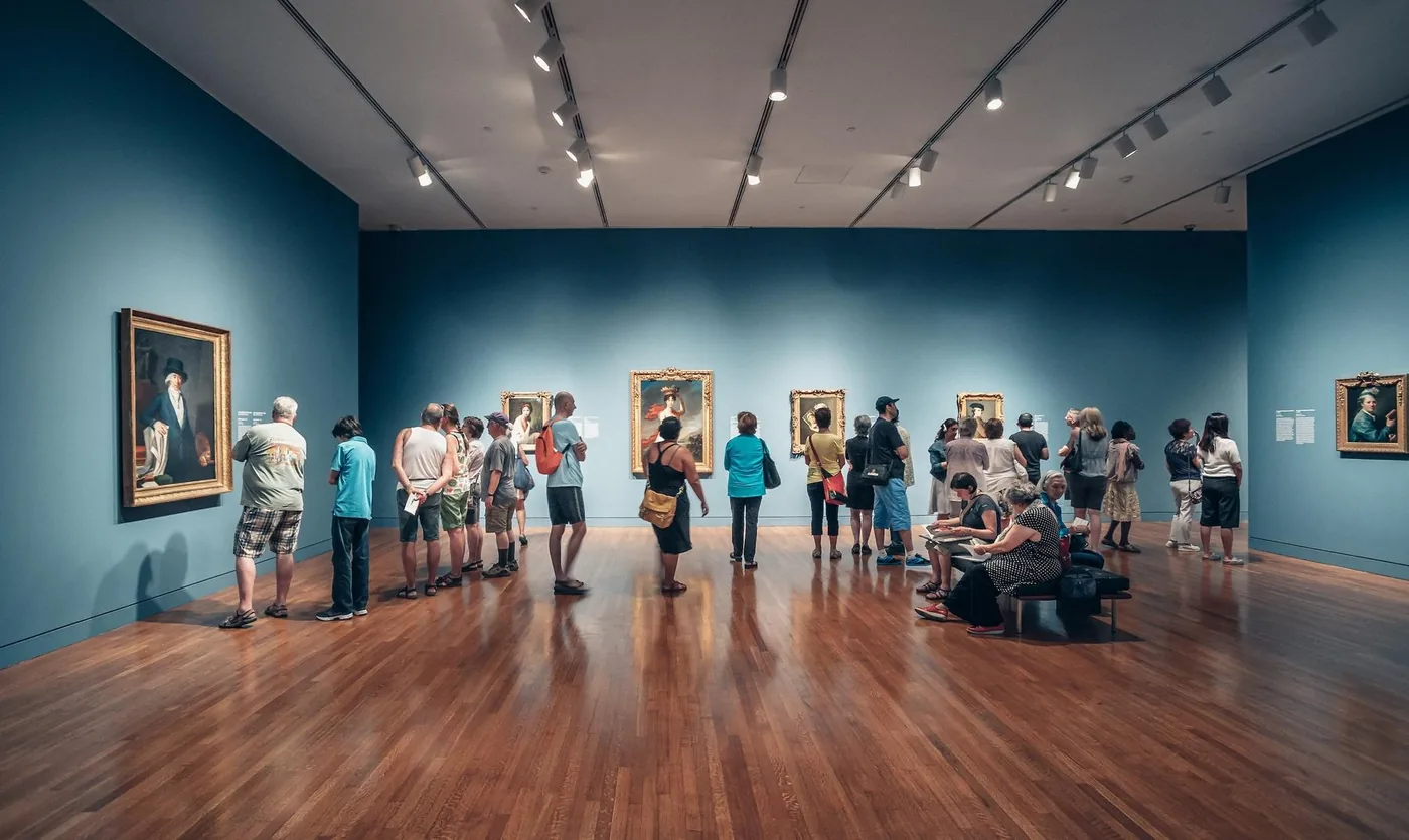 Gallery hung with portraits